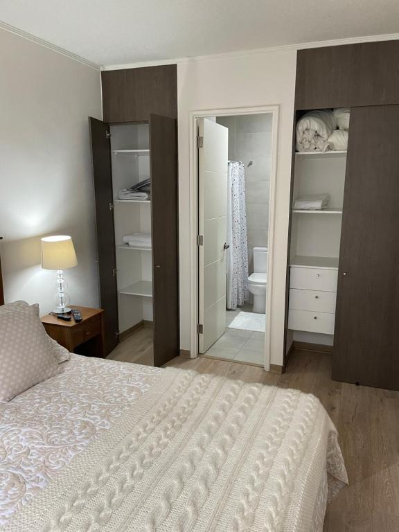 Postel nebo postele na pokoji v ubytování Apart Hotel R&P Depto A