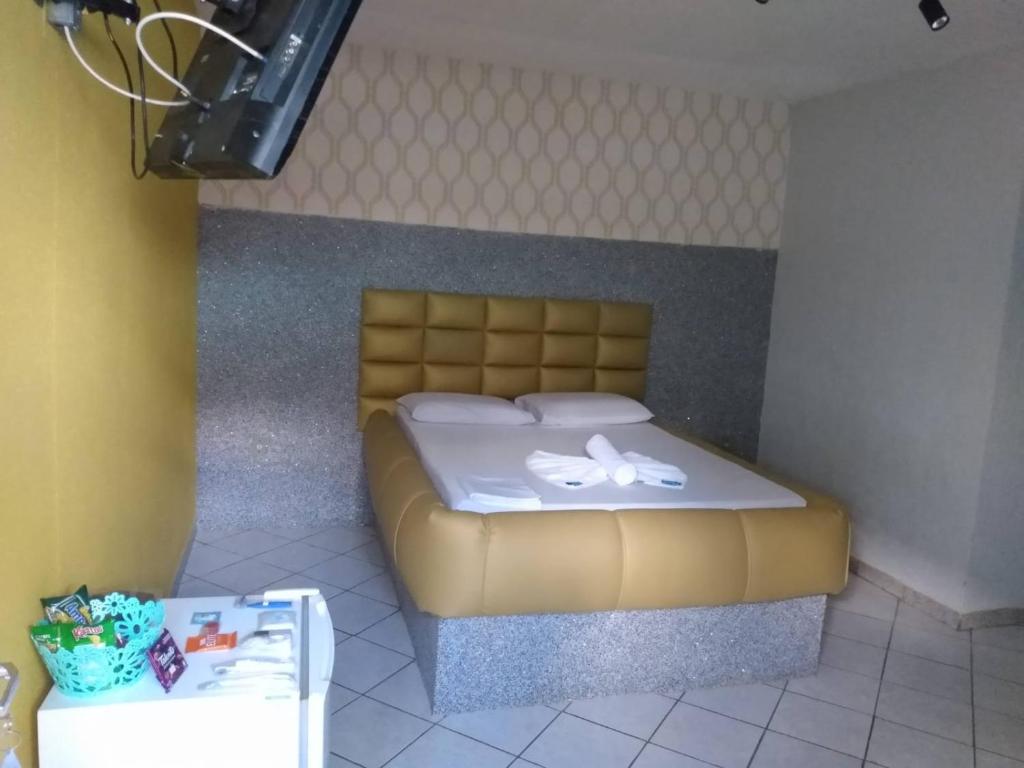 Cama o camas de una habitación en el Hotel l Motel 1001 Noites - Samambaia - BR 060
