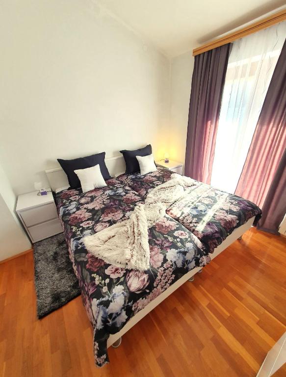 Postel nebo postele na pokoji v ubytování Lux D'Or Apartment