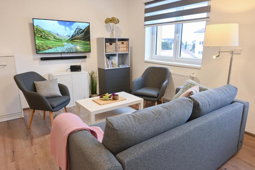 Telewizja i/lub zestaw kina domowego w obiekcie Apartmán Mija