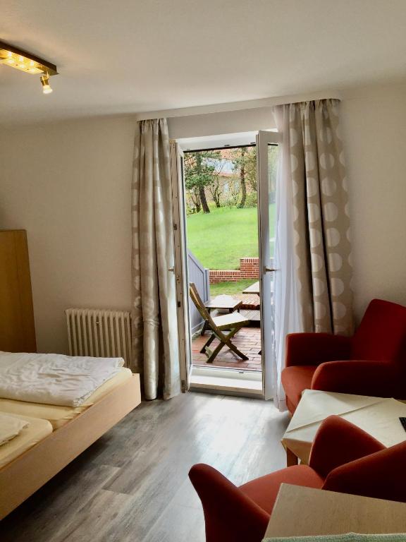 Postel nebo postele na pokoji v ubytování Haus Kap Horn