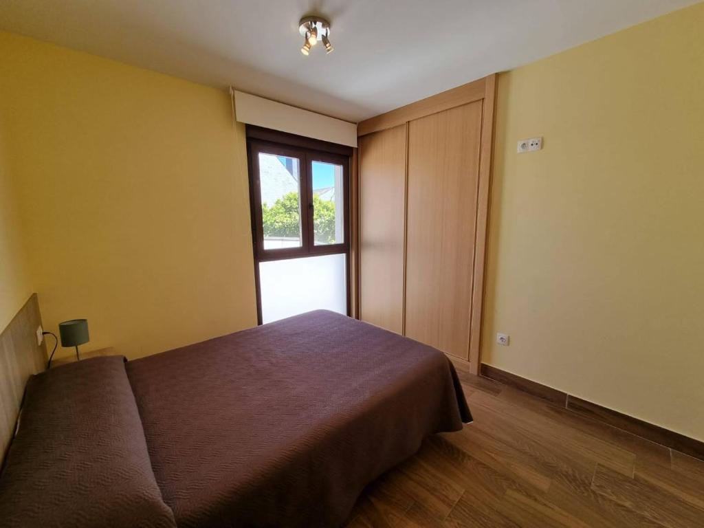 Posteľ alebo postele v izbe v ubytovaní Foz Playa Rapadoira - 3 dormitorios