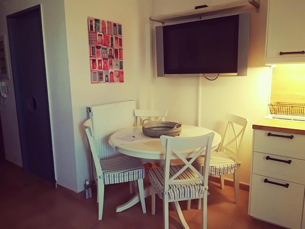 A kitchen or kitchenette at Lux House next to the Airport of Athens. Transport 24h