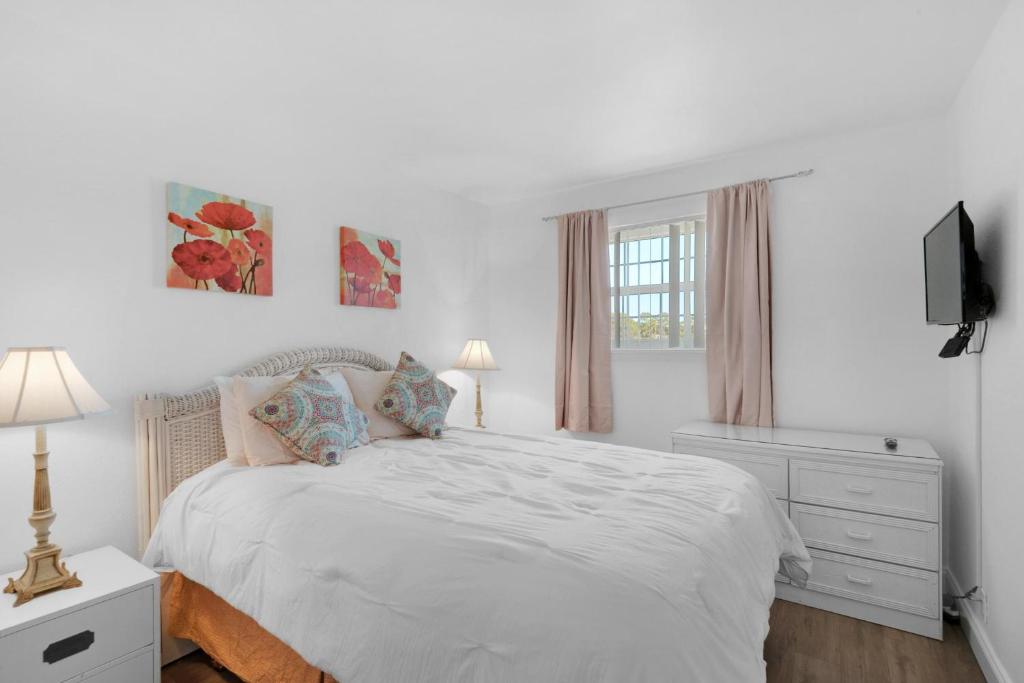 Ein Bett oder Betten in einem Zimmer der Unterkunft Beachy Keen