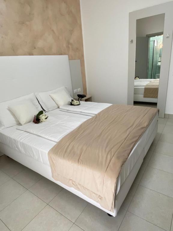 Postel nebo postele na pokoji v ubytování Hotel Bahia