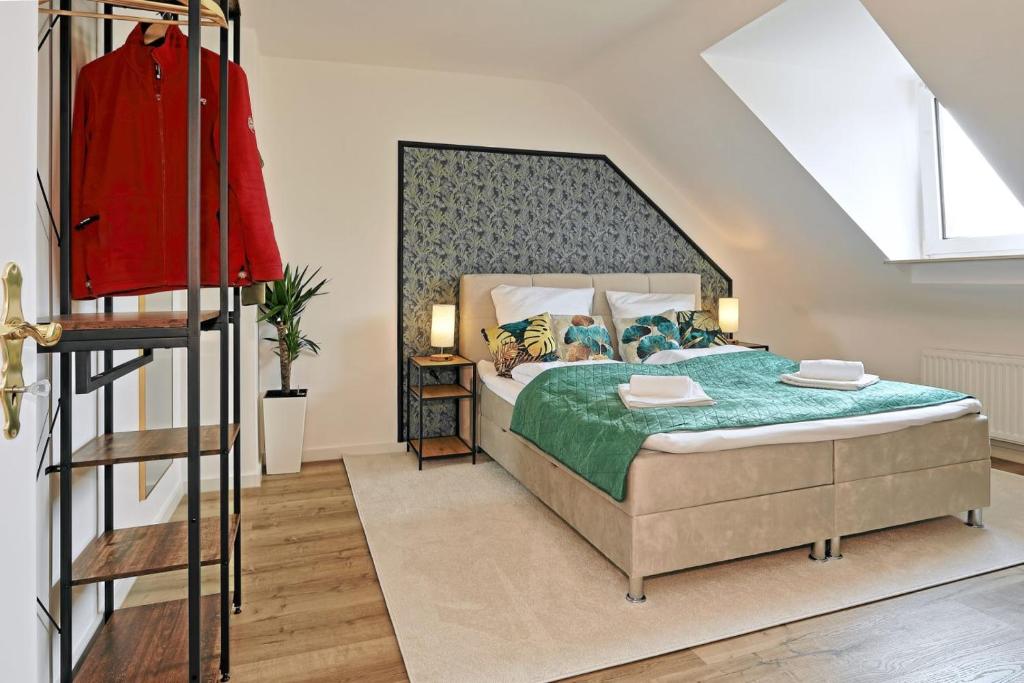 En eller flere senge i et værelse på NEAR MESSE! - Stay&Dream - 50qm - City - Kitchen - Netflix