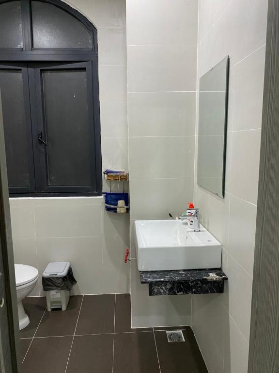Koupelna v ubytování Lex Homestay Hotel