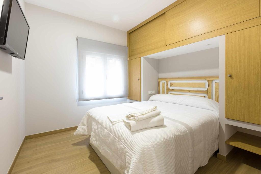 Postel nebo postele na pokoji v ubytování Las tres puertas