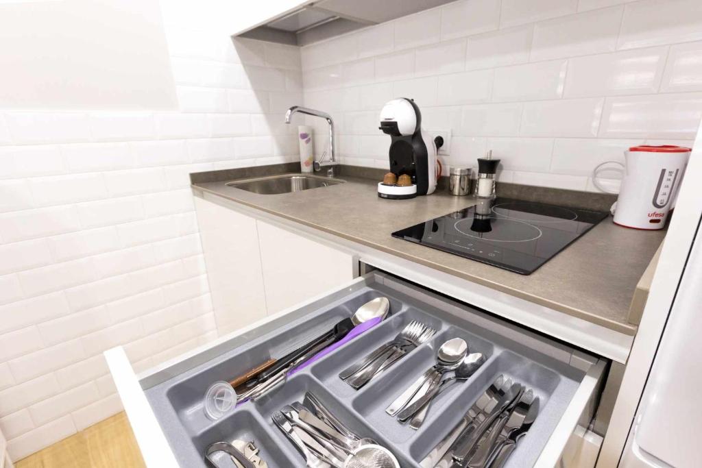 Kuchyň nebo kuchyňský kout v ubytování Las tres puertas
