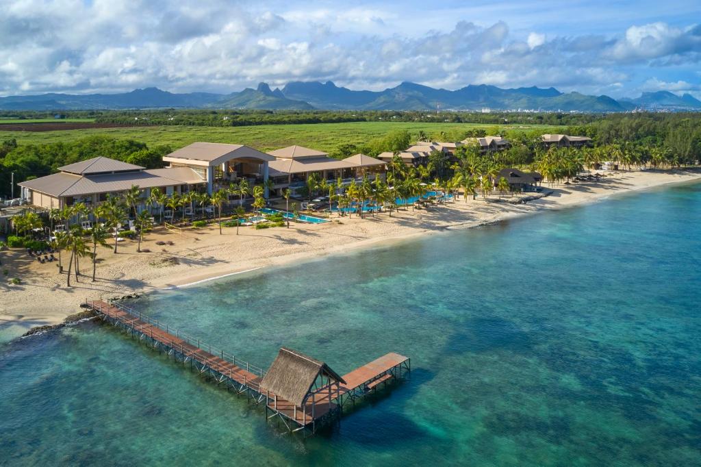 an aerial view of a resort on a beach at Le Meridien Ile Maurice in Pointe aux Piments