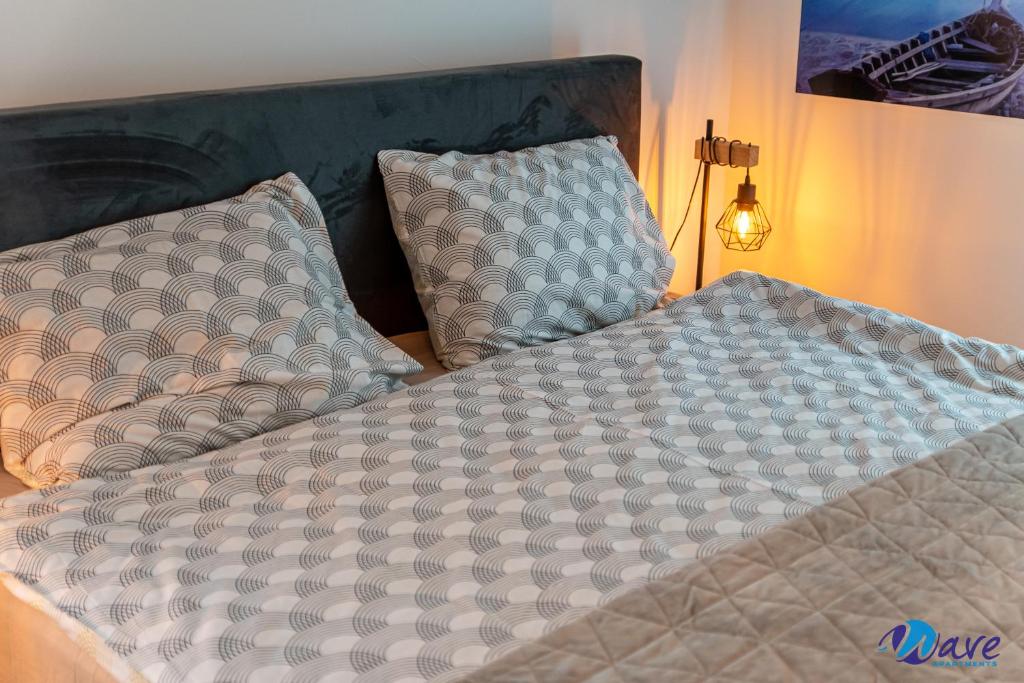Posteľ alebo postele v izbe v ubytovaní TWO BEDROOM MODERN APARTMENT near the AIRPORT