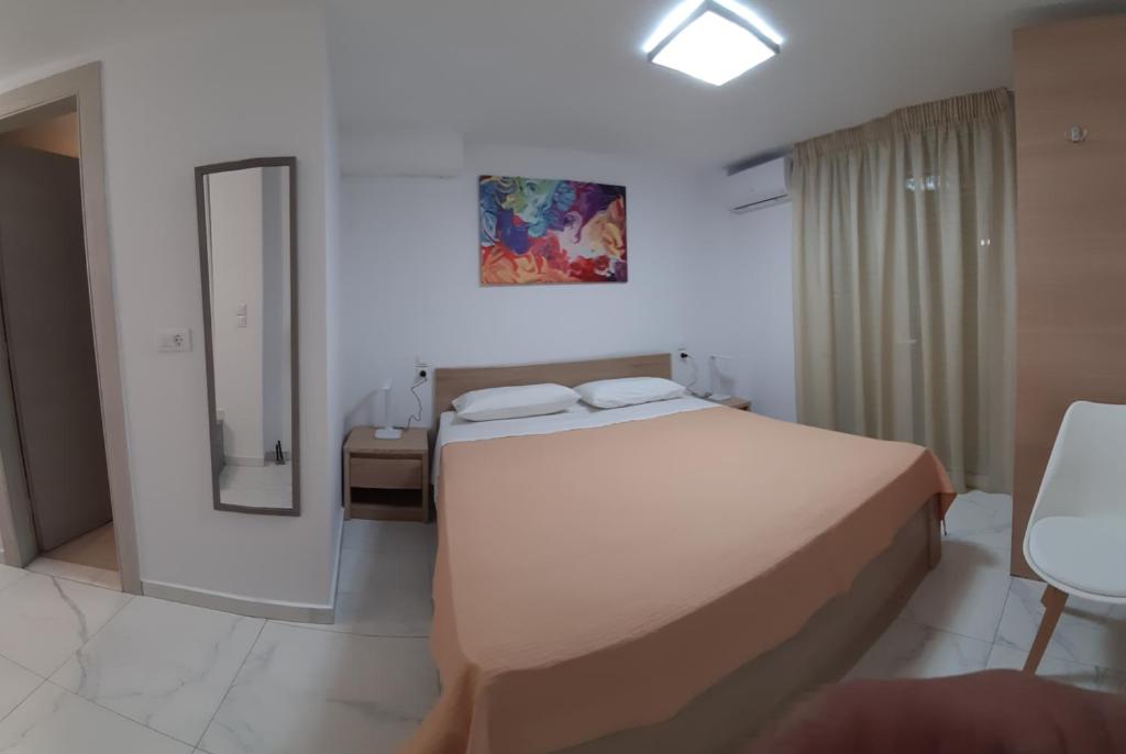Postel nebo postele na pokoji v ubytování FANERO Guesthouse