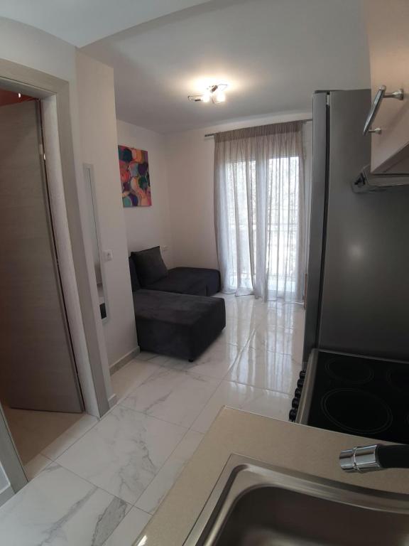 TV a/nebo společenská místnost v ubytování FANERO Guesthouse
