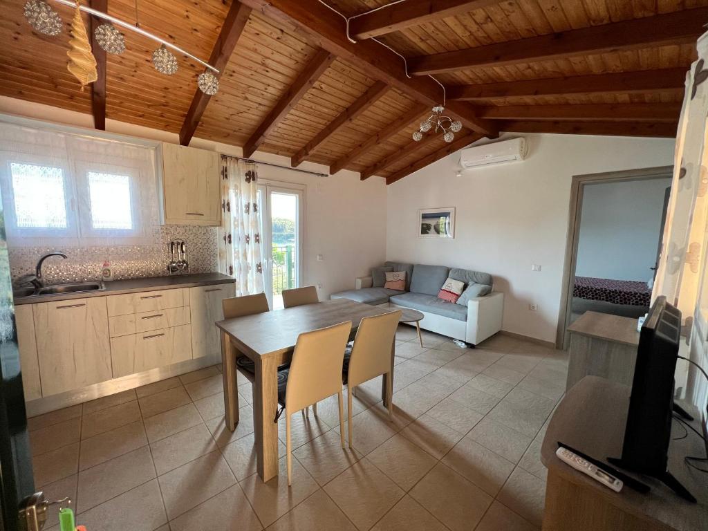 A kitchen or kitchenette at Votsalo Pool Apts