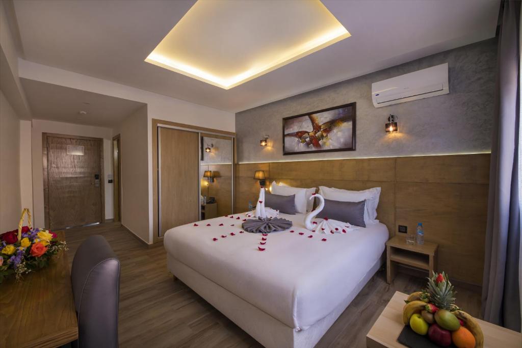 Postel nebo postele na pokoji v ubytování Stars Hotel & Spa