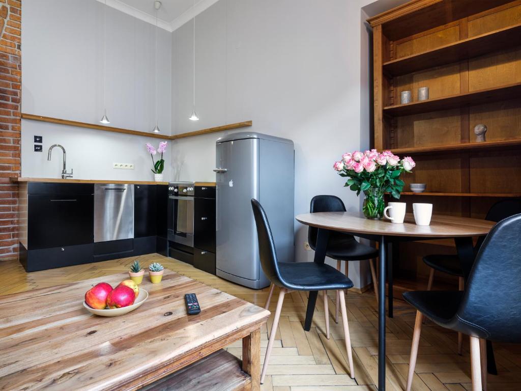 Kuchyňa alebo kuchynka v ubytovaní CracWoW Market Squere Apartment
