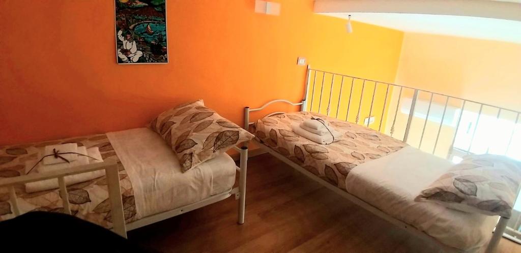A bed or beds in a room at Vacanze Napoletane