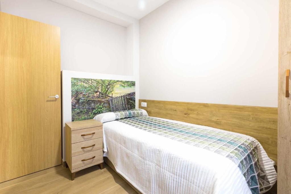 Postel nebo postele na pokoji v ubytování Las tres puertas