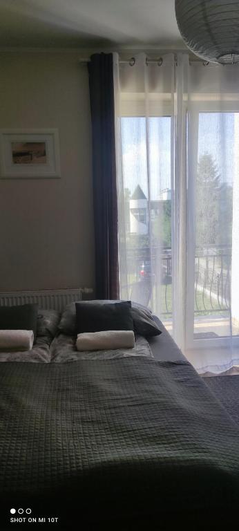 Pokoje Gościnne Nad Cukiernią w centrum miejscowości. - Tweepersoonskamer