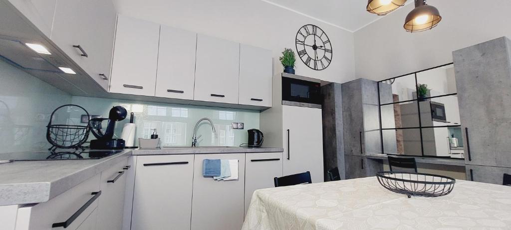 Kuchyňa alebo kuchynka v ubytovaní Central Apartments Astoria 2