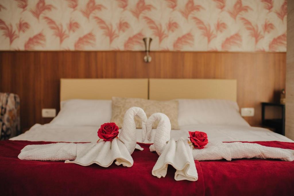 Postel nebo postele na pokoji v ubytování Hotel - Villa Lejla