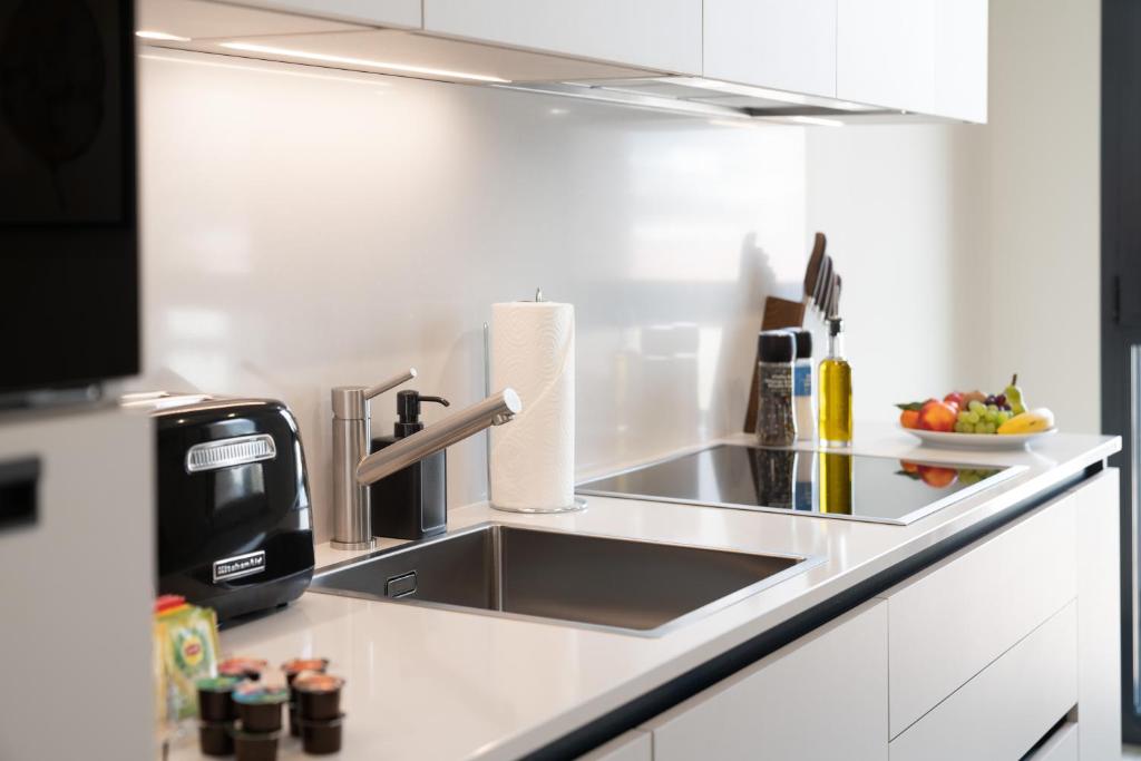 Kuchyň nebo kuchyňský kout v ubytování Swiss Hotel Apartments - Lugano