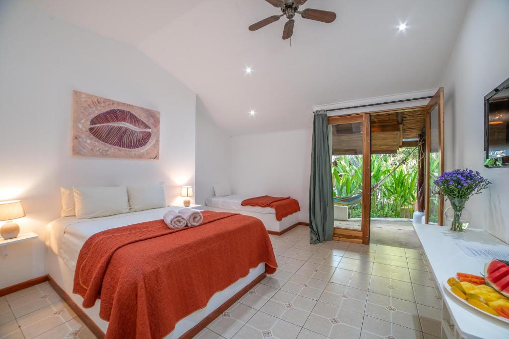 Postel nebo postele na pokoji v ubytování Hotel Pasatiempo