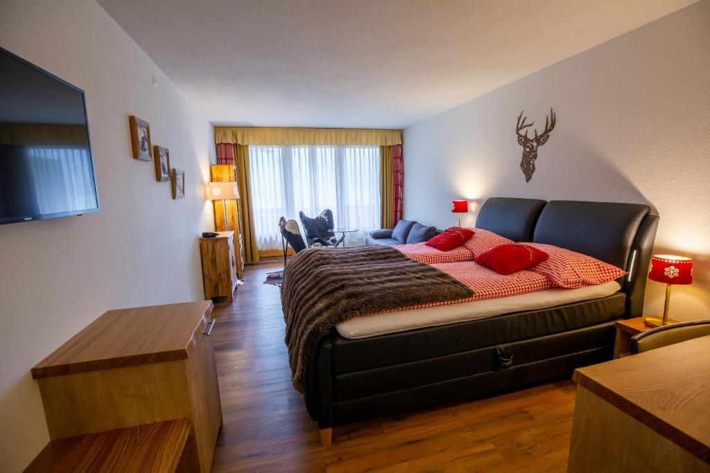Postel nebo postele na pokoji v ubytování Chalet-Hotel Beau-Site