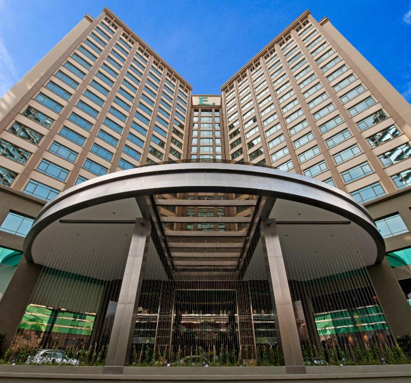 a large building with two tall buildings at Eastin Hotel Kuala Lumpur in Petaling Jaya