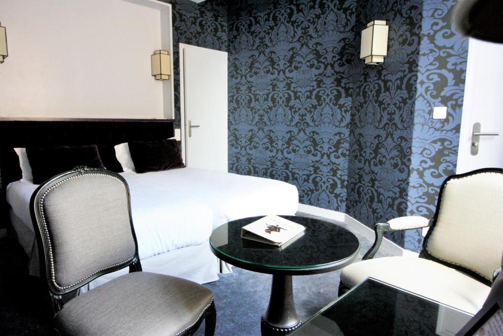 Posezení v ubytování Logis - Hôtel & Restaurant du Tribunal