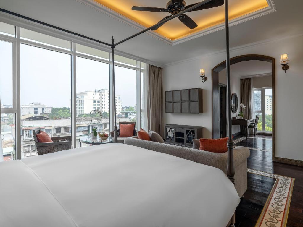 Postel nebo postele na pokoji v ubytování De Syloia Hotel
