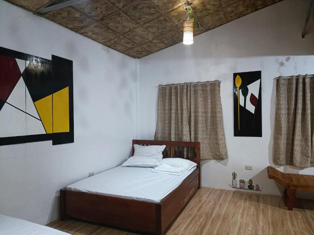 Postel nebo postele na pokoji v ubytování ANNI'S BEACH HOUSE