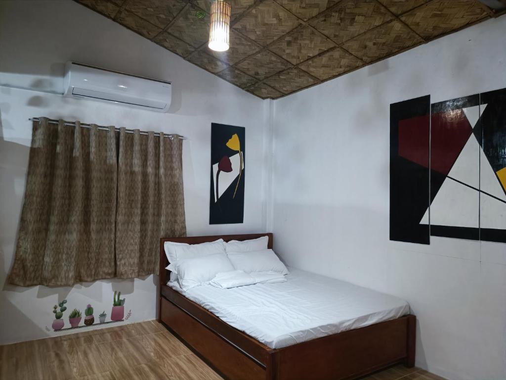 Postel nebo postele na pokoji v ubytování ANNI'S BEACH HOUSE