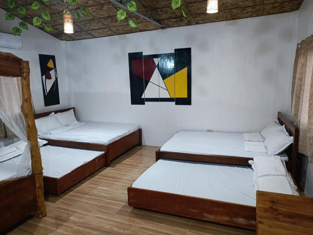 Postel nebo postele na pokoji v ubytování ANNI'S BEACH HOUSE