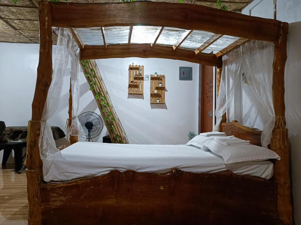 Postel nebo postele na pokoji v ubytování ANNI'S BEACH HOUSE