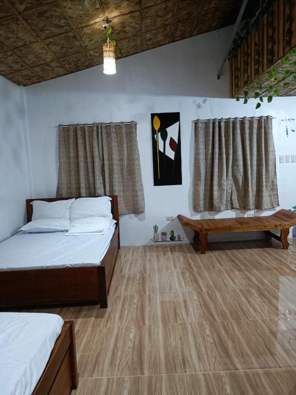 Postel nebo postele na pokoji v ubytování ANNI'S BEACH HOUSE
