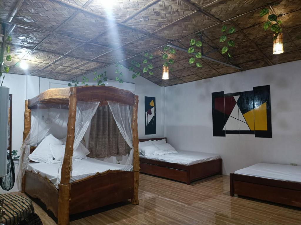 Postel nebo postele na pokoji v ubytování ANNI'S BEACH HOUSE