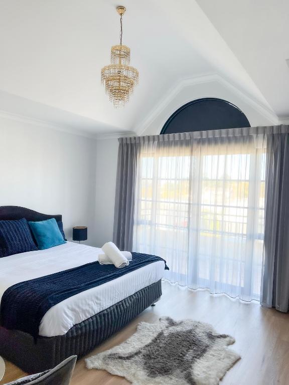Postel nebo postele na pokoji v ubytování Ganesha Wellness Spa
