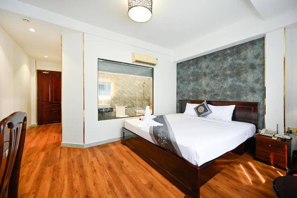 Voodi või voodid majutusasutuse TN Central Hotel toas