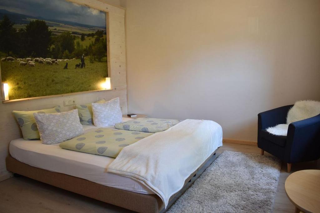 Postel nebo postele na pokoji v ubytování Hotel Kapelle Bed & Breakfast