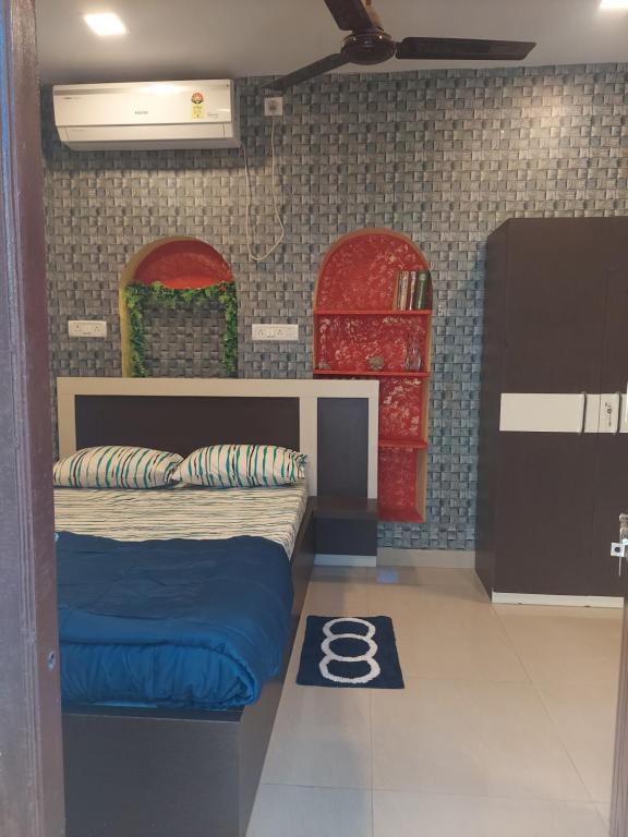 Postel nebo postele na pokoji v ubytování Ani's Homestay