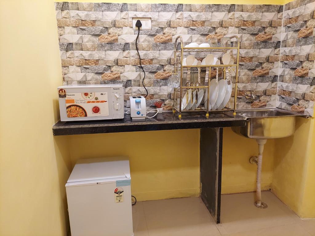 Kuchyň nebo kuchyňský kout v ubytování Ani's Homestay