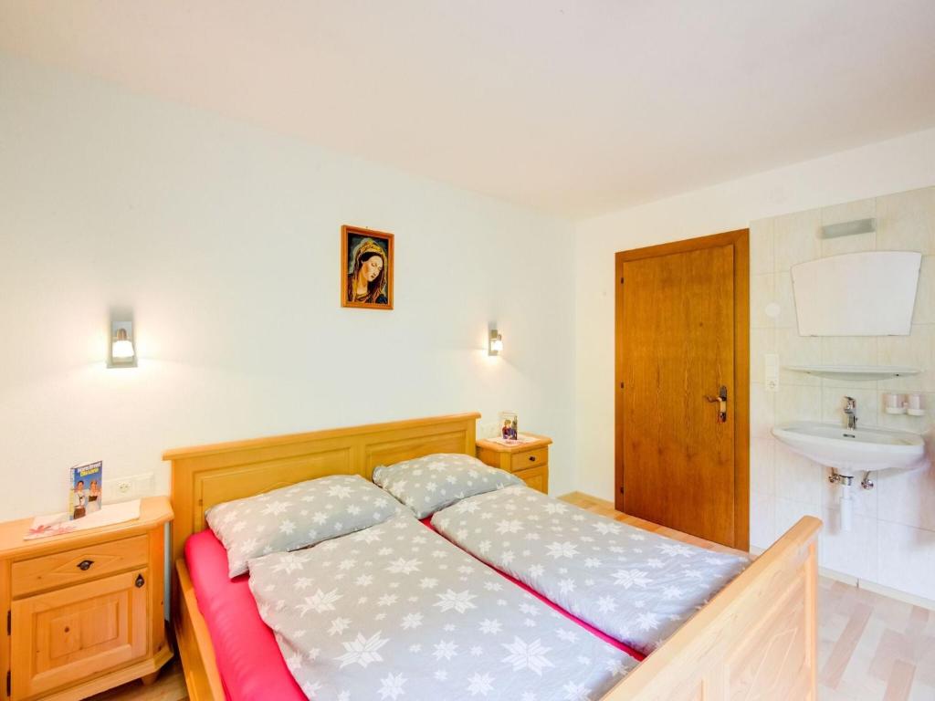 Posteľ alebo postele v izbe v ubytovaní Scenic Apartment in Tirol with Garden