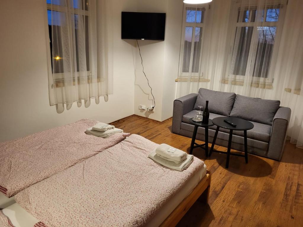 Postel nebo postele na pokoji v ubytování Pension Family