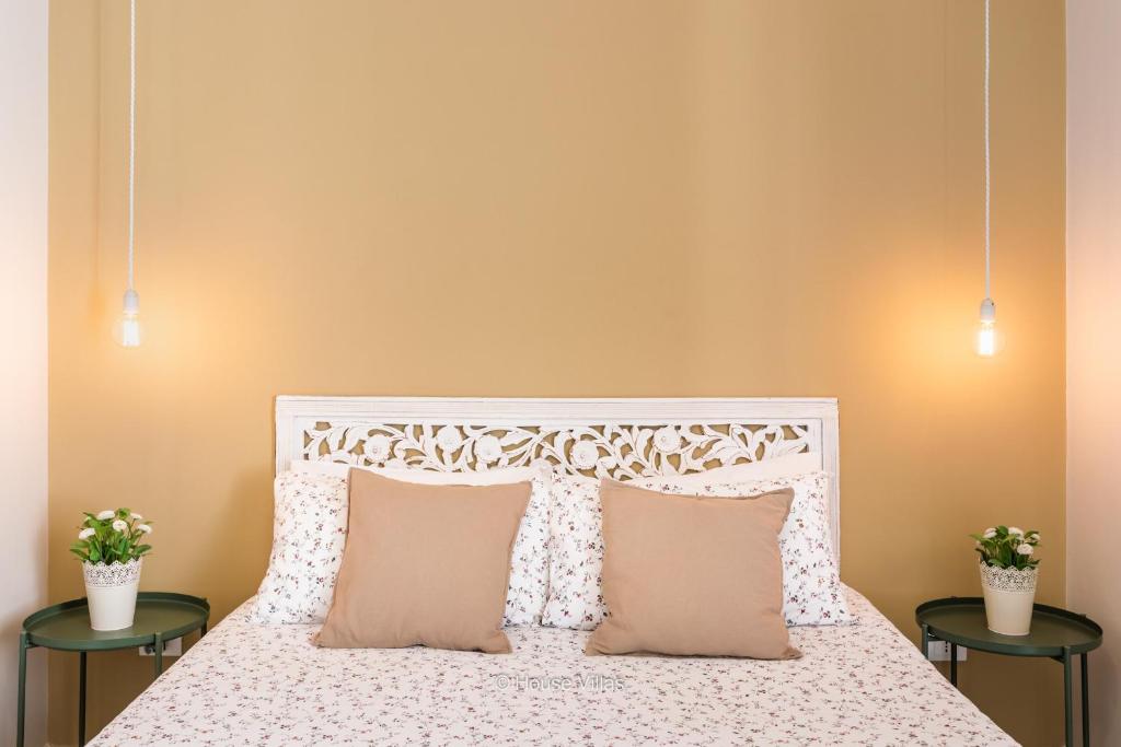 Postel nebo postele na pokoji v ubytování Il 49 Rooms Noto