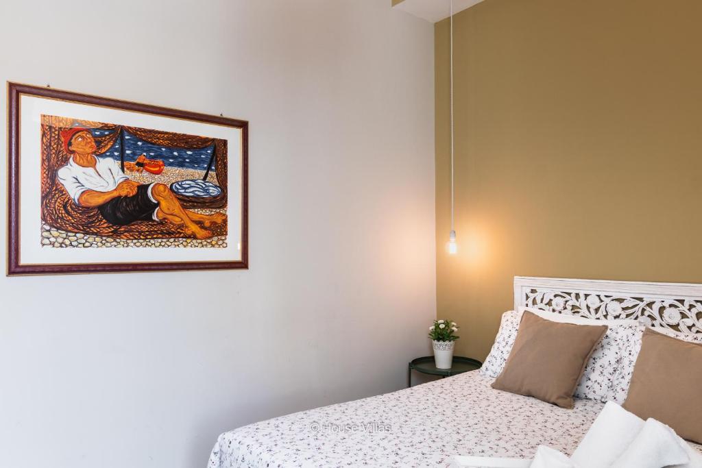 Postel nebo postele na pokoji v ubytování Il 49 Rooms Noto