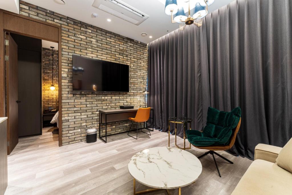 TV a/nebo společenská místnost v ubytování Hotel SoulHada