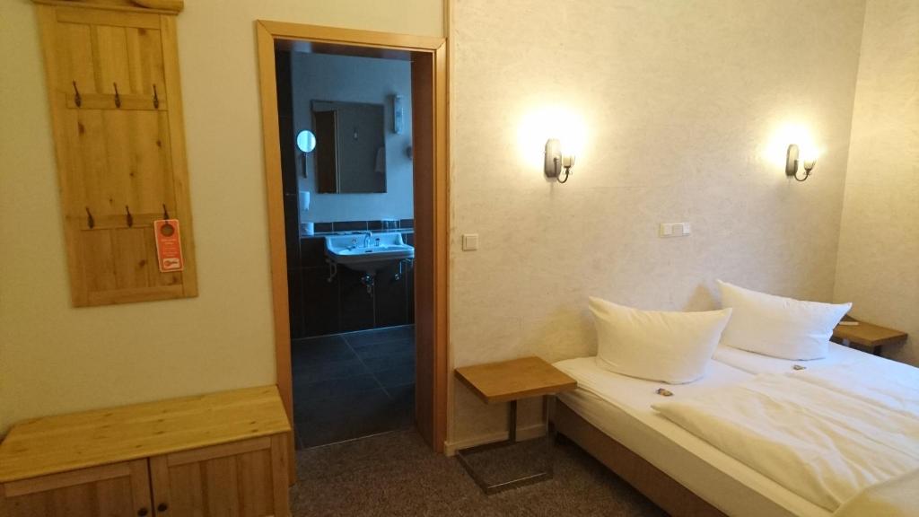 Postel nebo postele na pokoji v ubytování Hotel Kapelle Bed & Breakfast