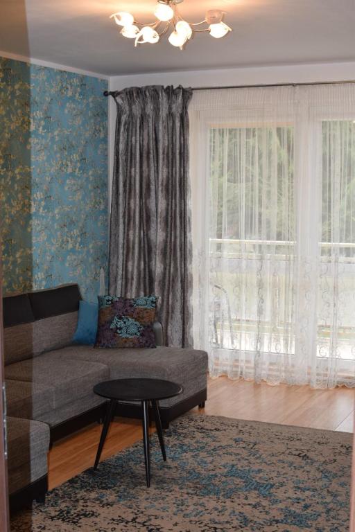 Posedenie v ubytovaní Apartament Galeria Warmińska