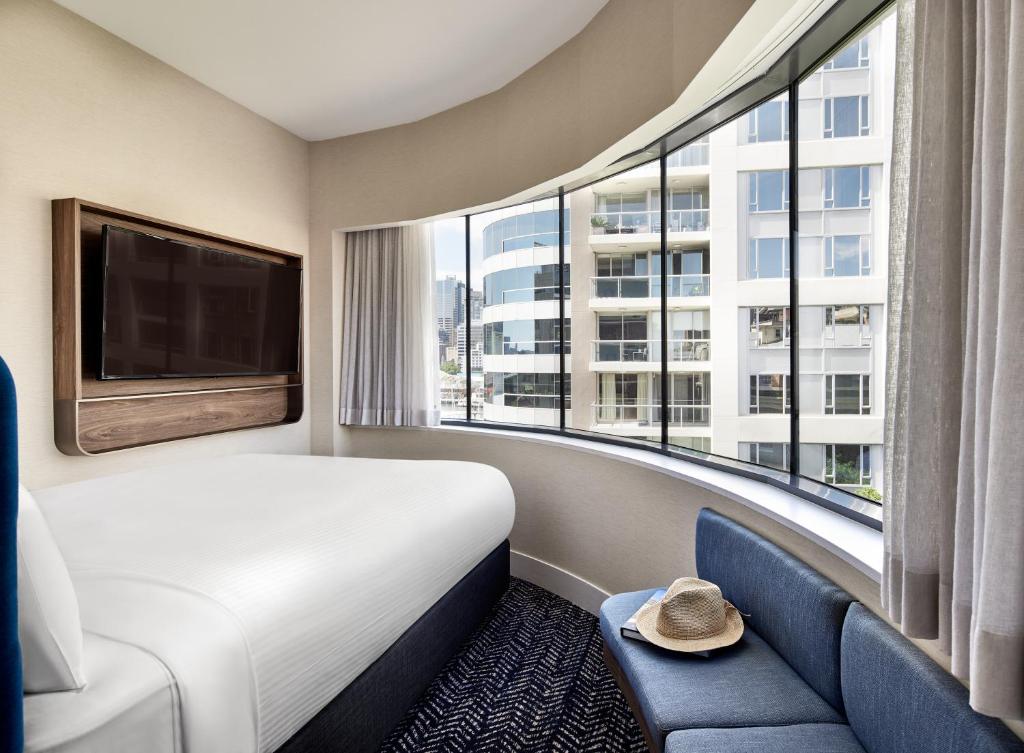 Postel nebo postele na pokoji v ubytování Aiden by Best Western Darling Harbour